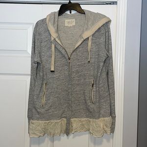 Beautiful sweatshirt jacket with ruffle detail at the bottom